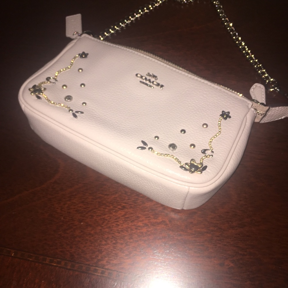 Coach wristlet with studs